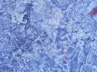 Blue crystals lock tight, jagged ice meets the light, cold paths show the way