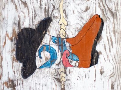 Boot and grain unite, faded paths trace the heavy, time marks the wood art