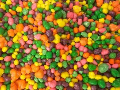 Bright pebbles of sweet, rainbow hues in every bite, sugary mountain