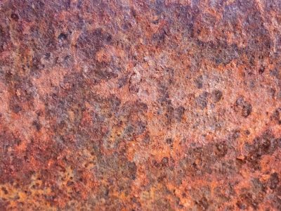 Brown grit claims the field, jagged peaks meet the soft light, years leave a deep trace