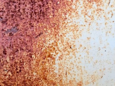 Dark grit flows so thick, orange mist holds the surface, time leaves a deep mark