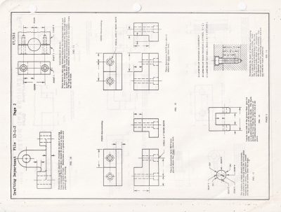 Lines of drafting ink, technical marks guide the eye, paper holds the plan