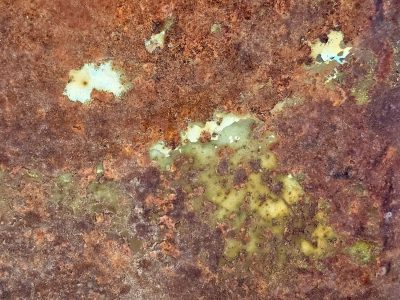 Orange grit claims all, jagged pits mark the heavy, rust turns to the dust