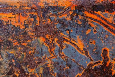 Orange waves flow thick, blue skin turns to heavy grit, time leaves a deep mark