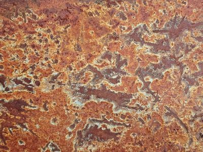 Orange waves flow thick, heavy grit claims the skin, time leaves a deep mark