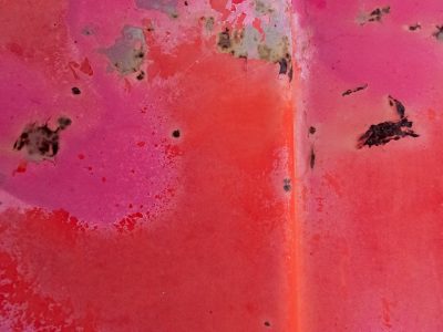 Pink paint starts to peel, rust invades the crimson field, iron shows its age