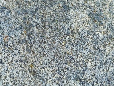 Pink grains meet the grey, heavy ridges hold the field, mineral stays in place