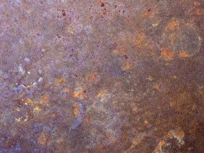 Purple mist holds fast, orange grit claims the heavy, time leaves a deep mark