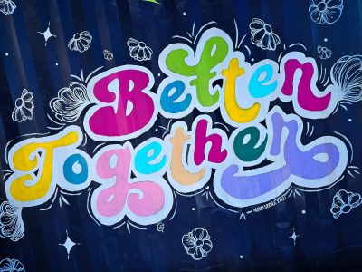 Red fields meet the light, faded skin holds the finish, time wears the surface