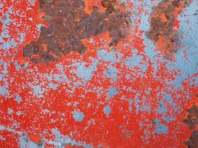 Red fields meet the light, grey paths trace the heavy skin, grit marks the finish