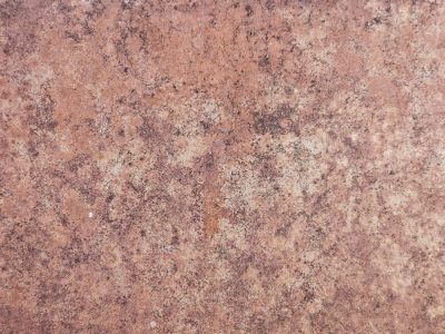 Rust devours the iron, orange pits cover the steel, decay claims the surface