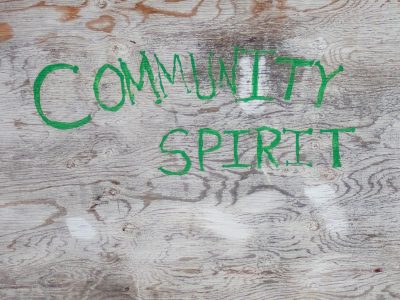 Silver grain flows fast, horizontal ridges meet light, weather carves the line