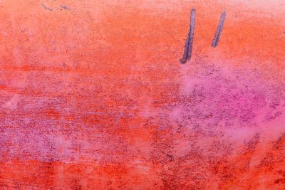 Silver skin has light marks, jagged scars trace the heavy, grit marks the finish