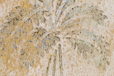 White paint flakes away, jagged pits mark the heavy, metal shows the wear