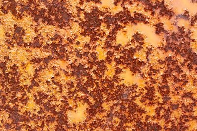 Orange flakes arise, iron yields to slow decay, rough surface of time