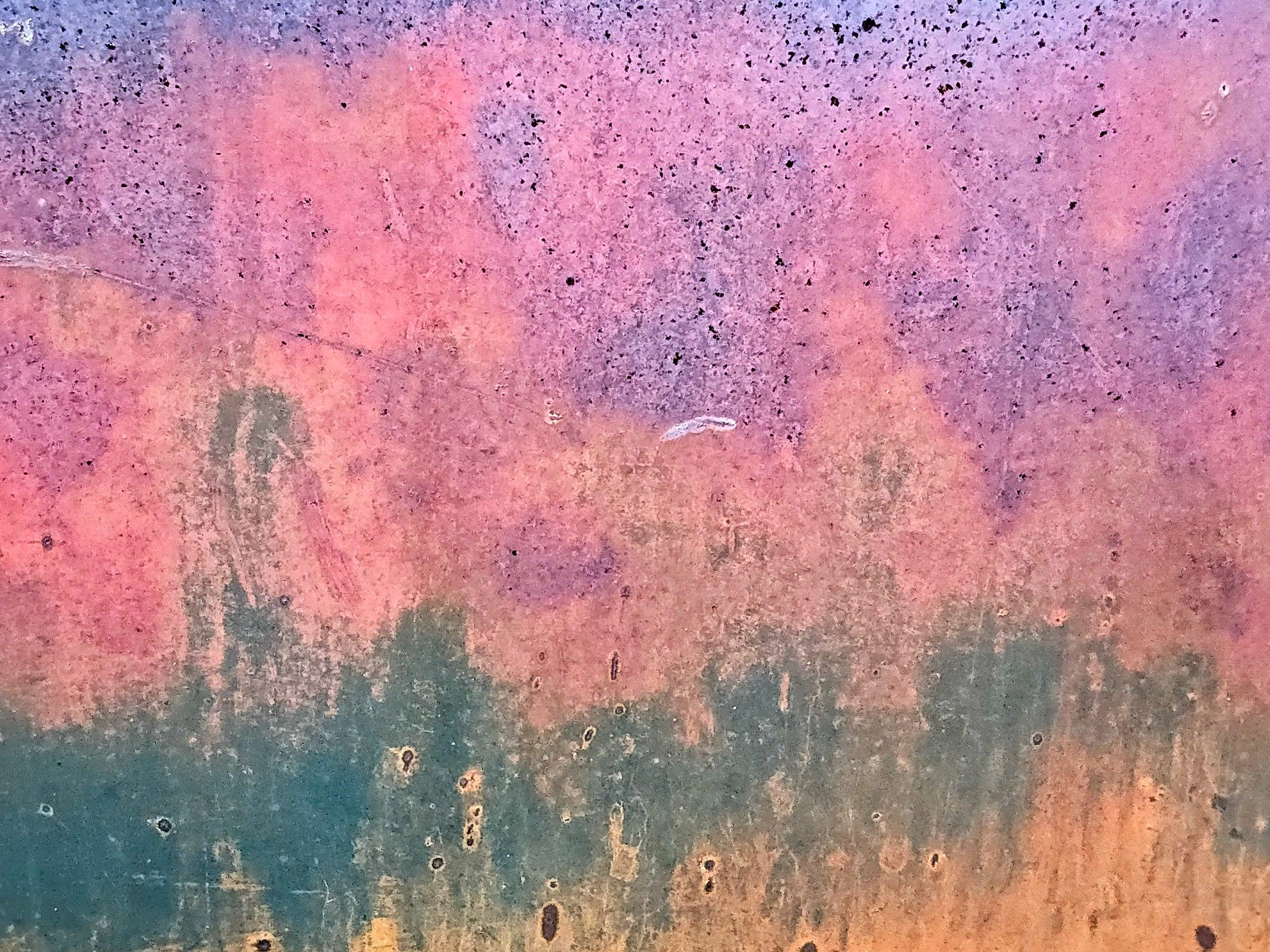 Yellow fields meet grit, heavy orange claims the field, time marks the metal