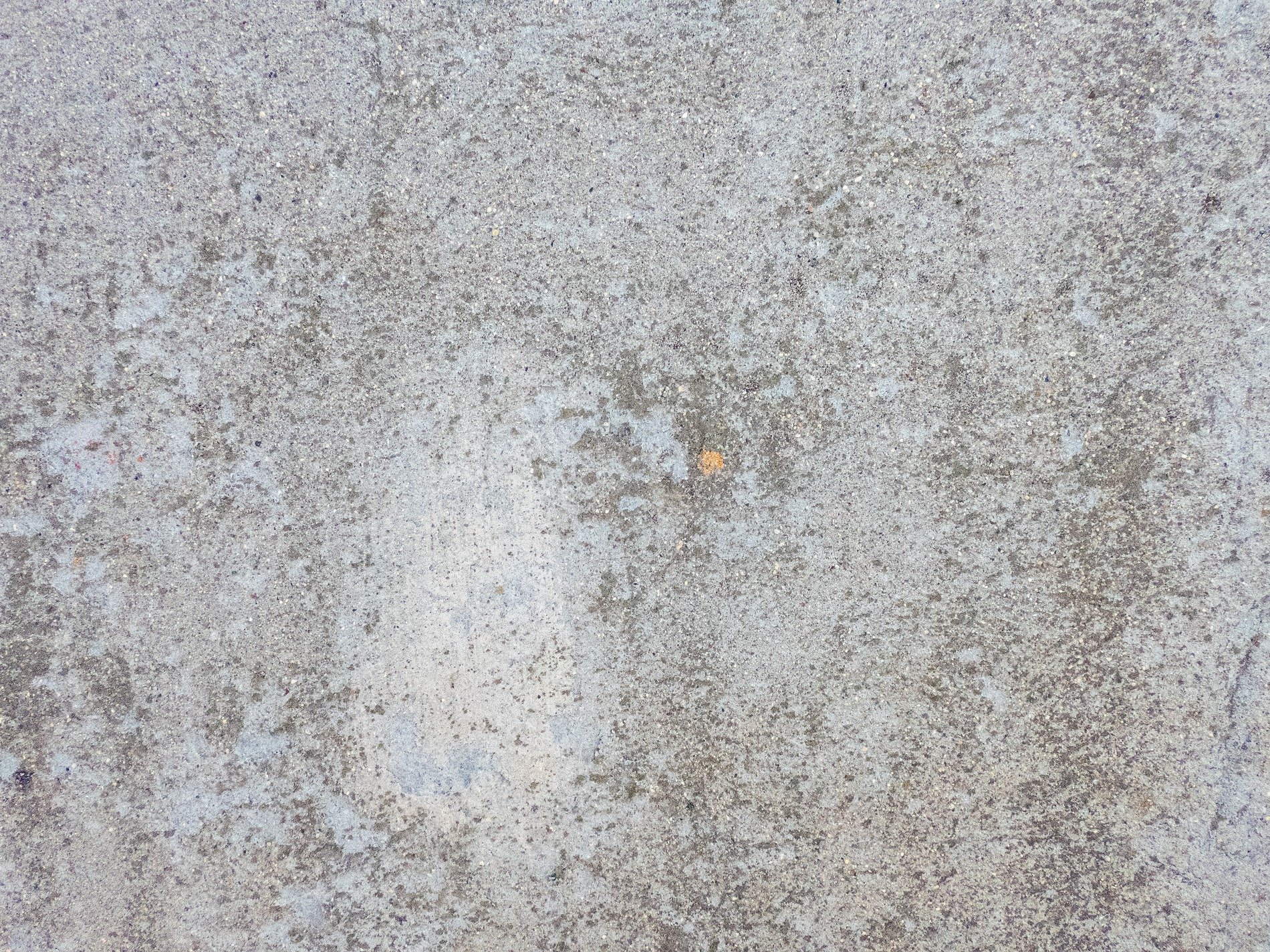 Grey dust settles deep, rough grains touch the open air, solid ground endures