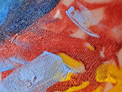 Pigment fills the pores, vibrant colors trace the lines, canvas made of life